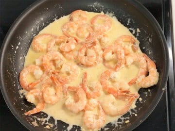 The shrimp were added back to the skillet.