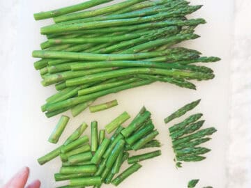 Chopping the asparagus.