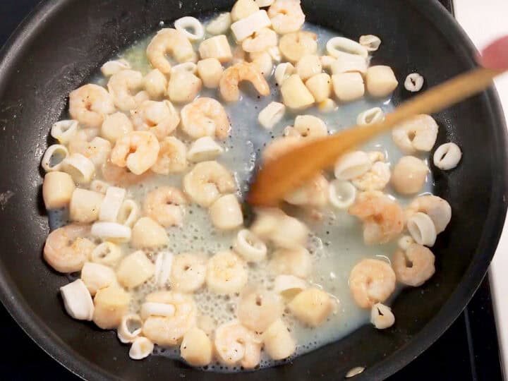 Cooking the seafood.