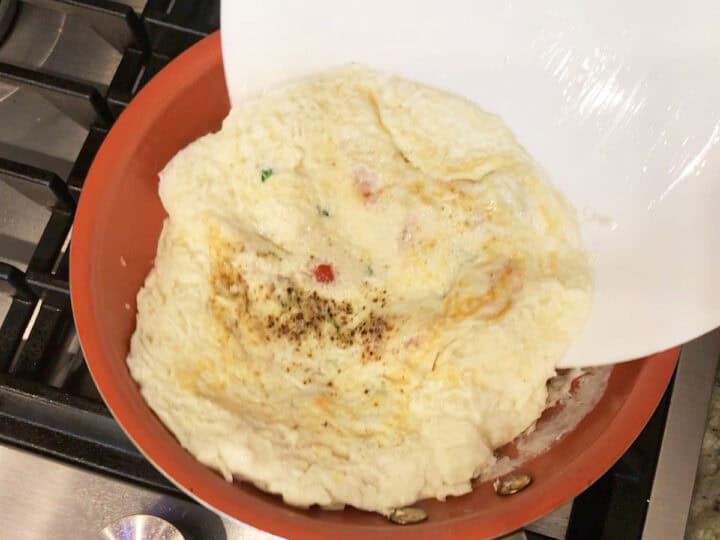 Flipping the omelette.