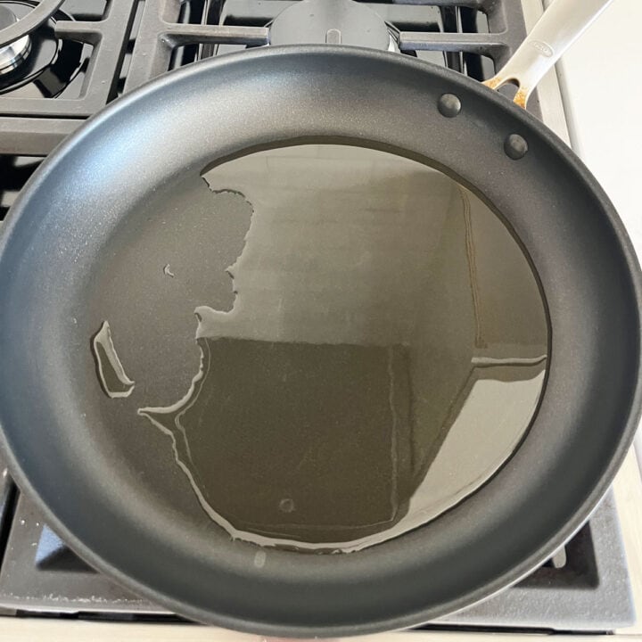 Heating the oil in a skillet.
