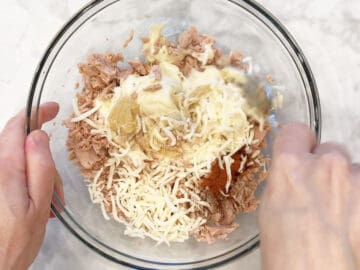 Mixing the ingredients in a bowl.
