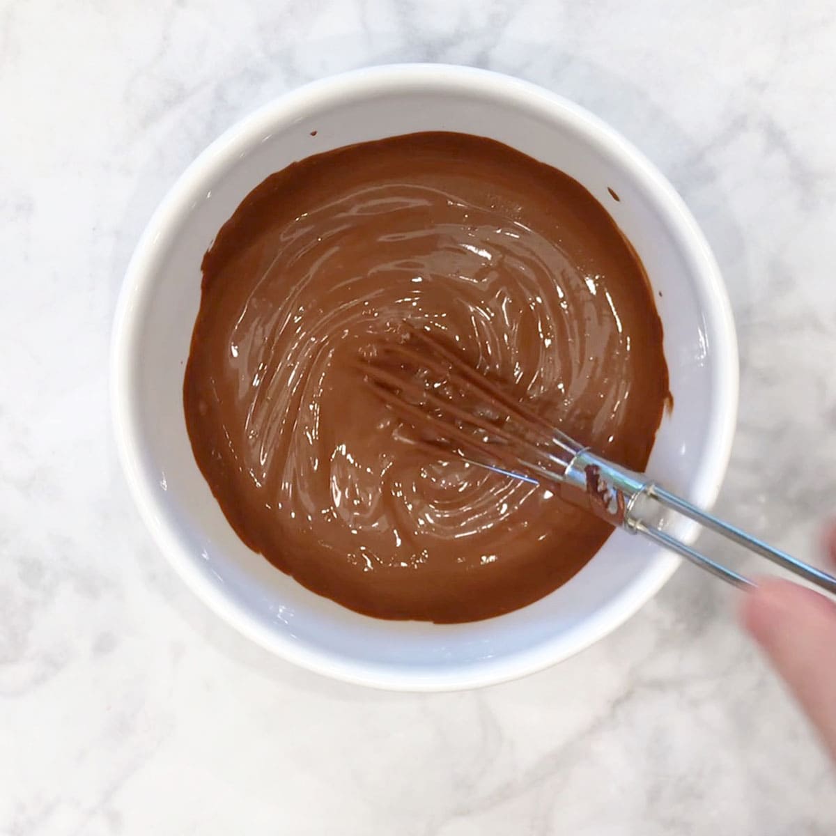 The custard mixture is in a bowl, ready for baking.