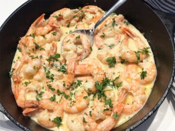 Creamy shrimp are served.