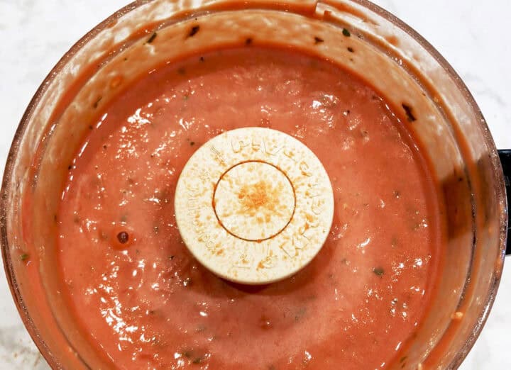 The soup is ready in the food processor.