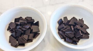 Two bowls with chocolate chunks.