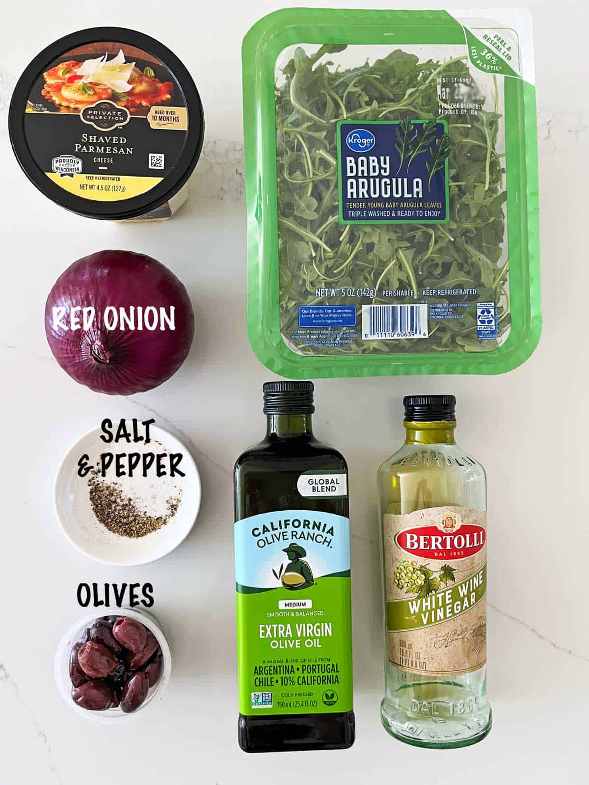 The ingredients needed to make an arugula salad.