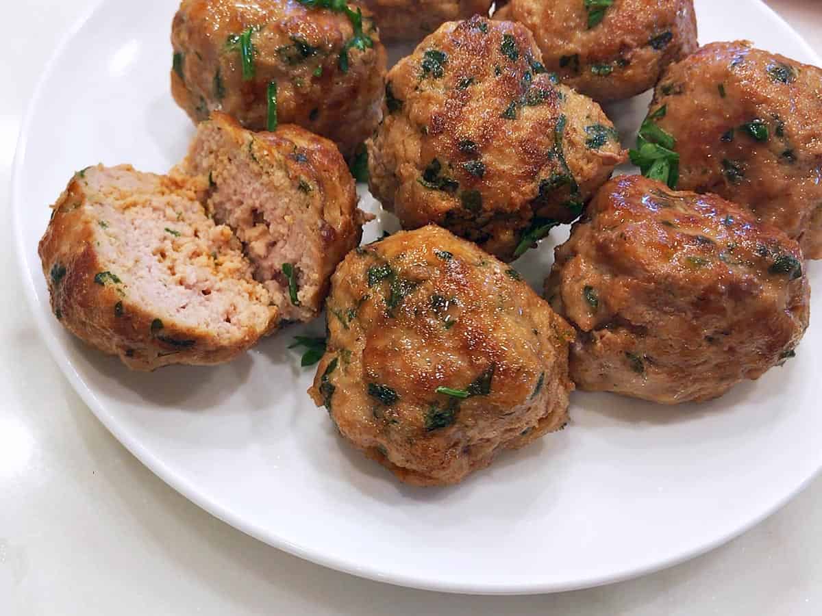 Showing off the fluffy inside of a meatball.