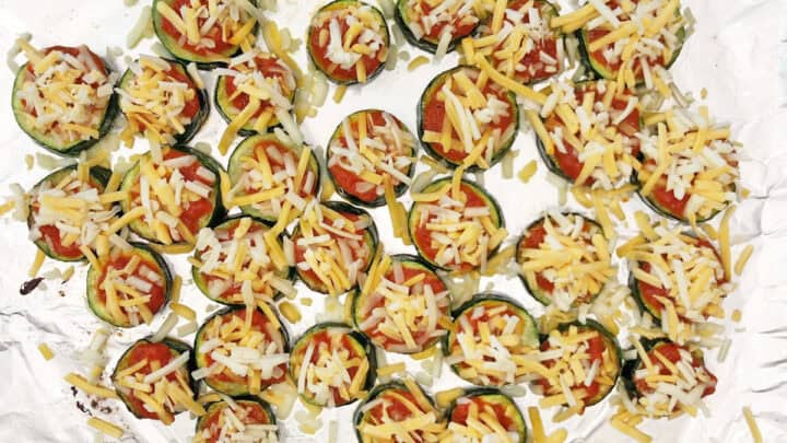 The zucchini slices were topped with marinara sauce and shredded cheese.