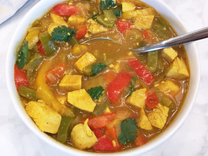 Turkey curry is served in a bowl.