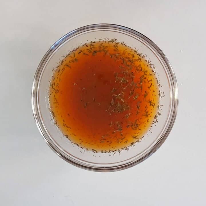 Braising liquid in a bowl.