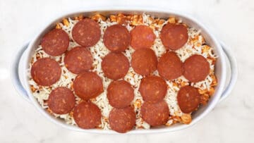 The casserole was topped with cheese and pepperoni before baking.