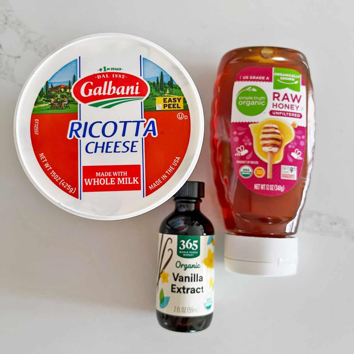 The ingredients needed to make a ricotta dessert.
