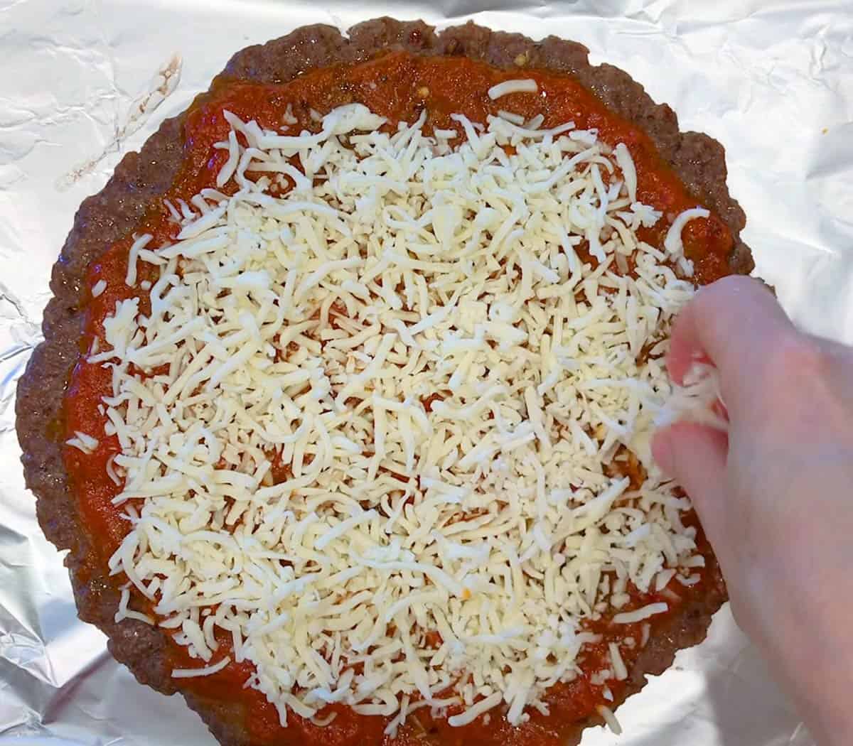 Adding the toppings.