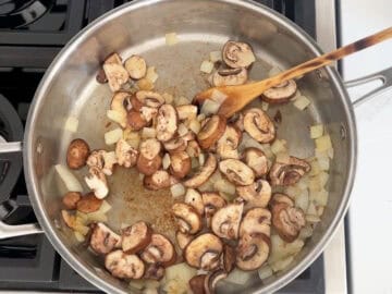 Sauteing the mushrooms.