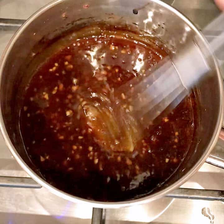 Preparing the teriyaki sauce in a small saucepan.