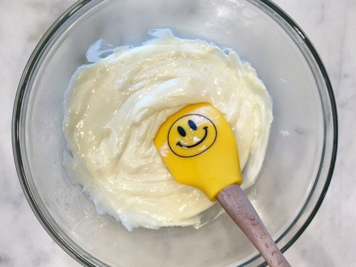 The cheeses were melted in a bowl.