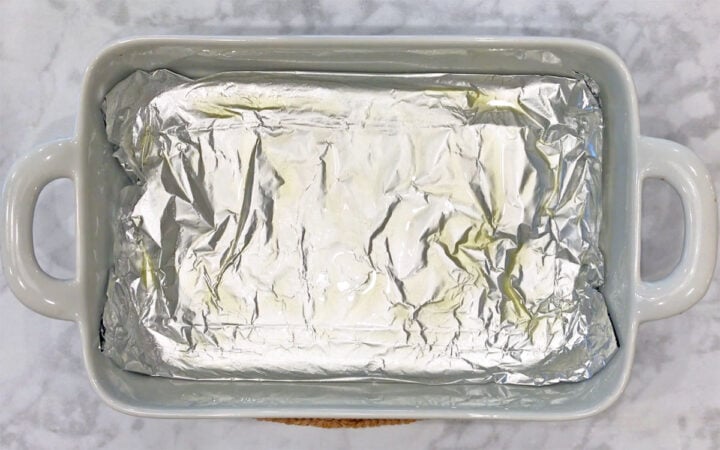 Foil-lined and greased baking dish.