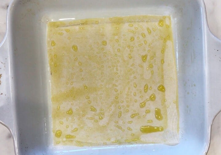 A square pan lined with parchment and greased.