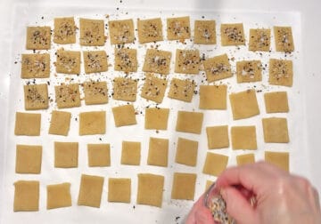 Seasoning the crackers.