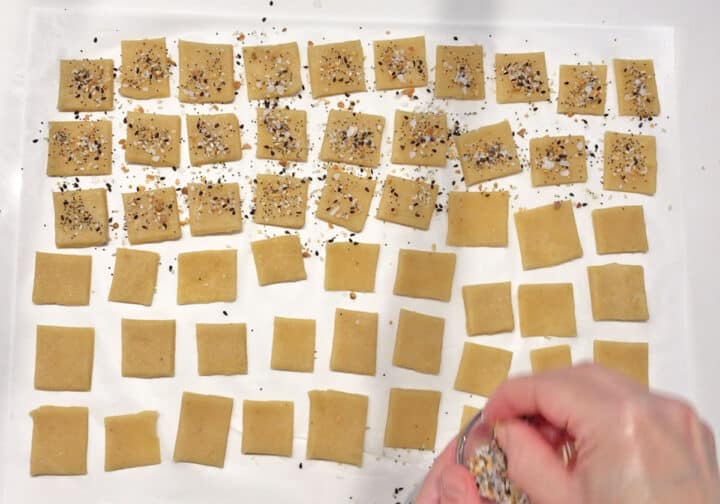 Seasoning the crackers.