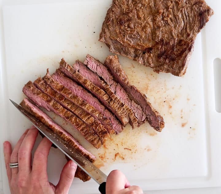 Slicing the steak.