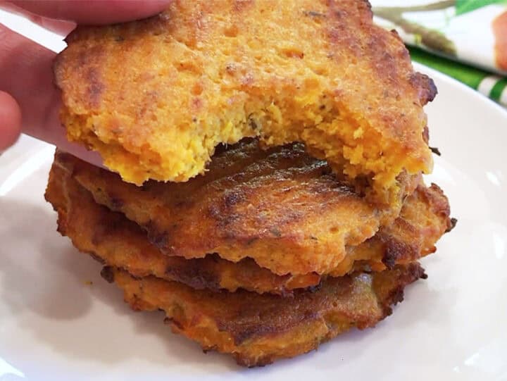 A stack of patties, one of them with a bite.