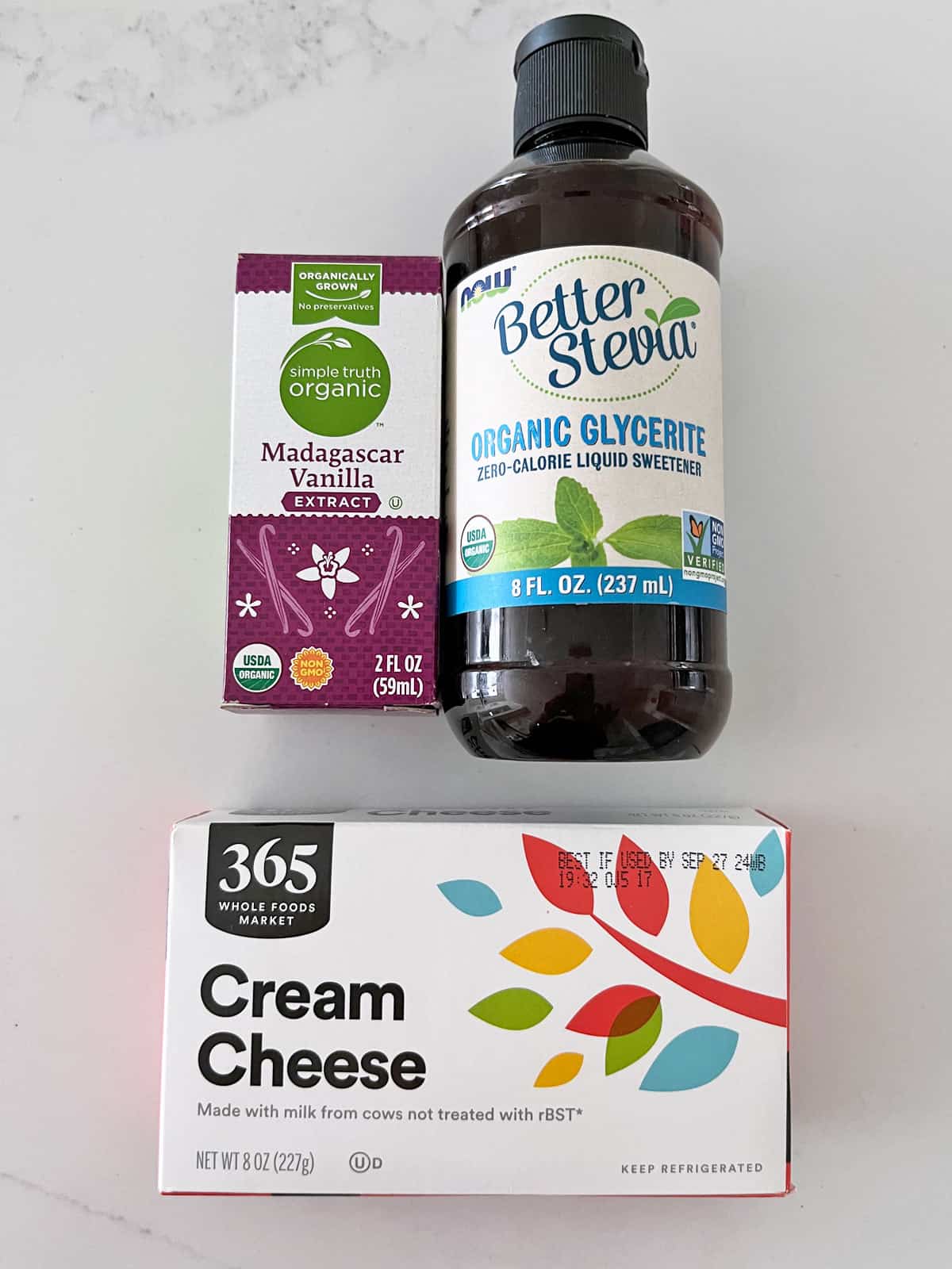 The ingredients needed to make keto cream cheese frosting.