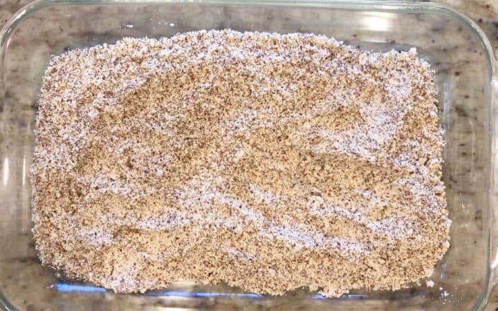 A shallow container with almond meal.