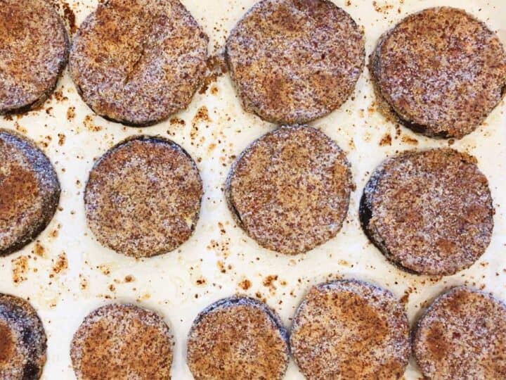 The coated eggplant rounds are fully baked.