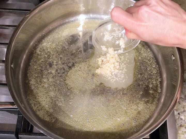 Cooking garlic in butter.