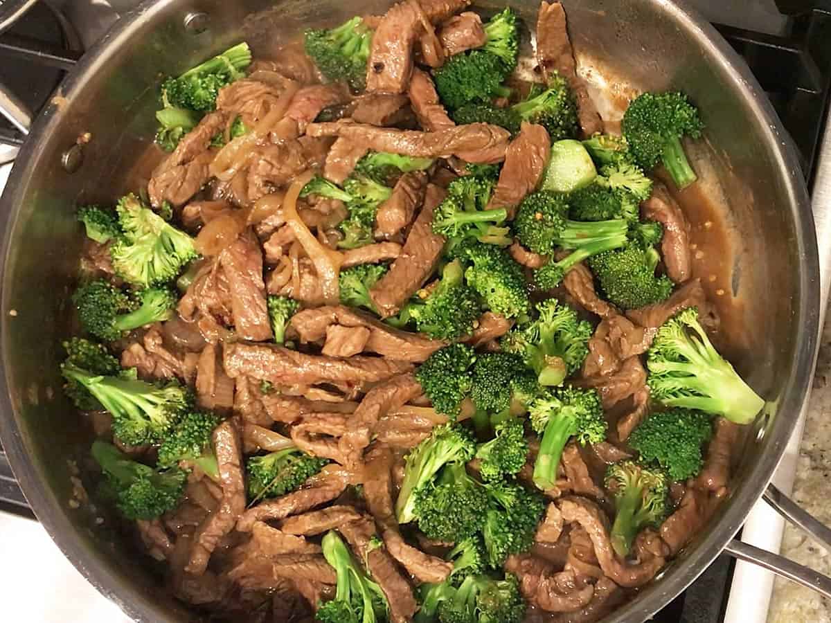 The broccoli was added to the skillet.