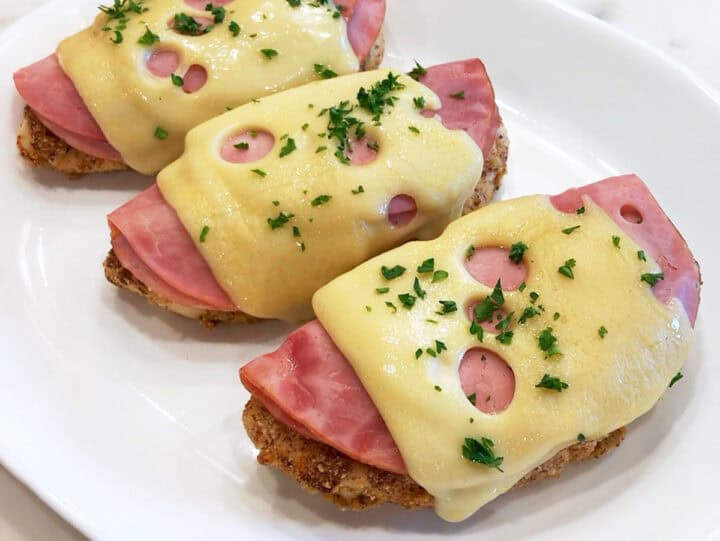 The chicken is served on a white platter.