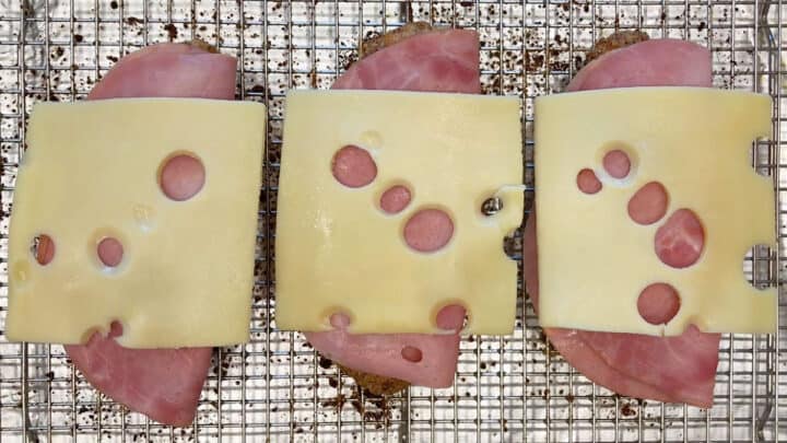 The chicken was topped with ham and cheese.