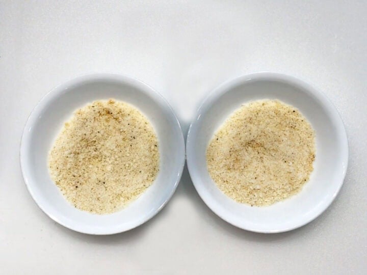 Two bowls with parmesan and spices.