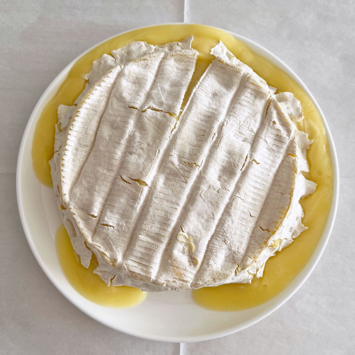 This brie has a thin rind and melted during baking.