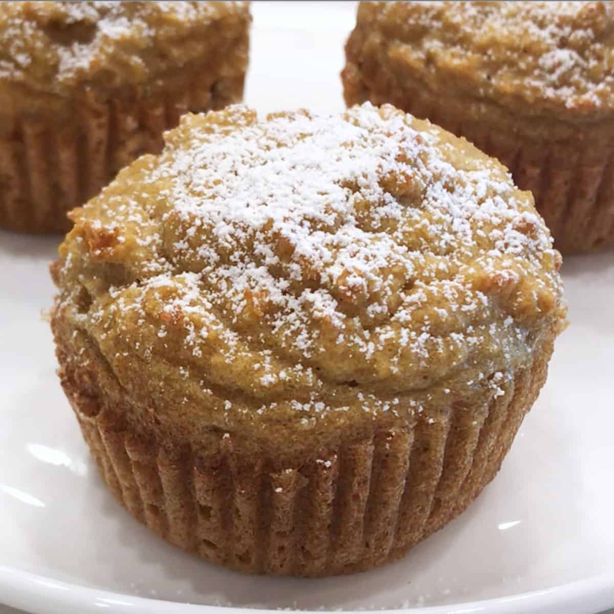Muffins made with baking soda are darker.