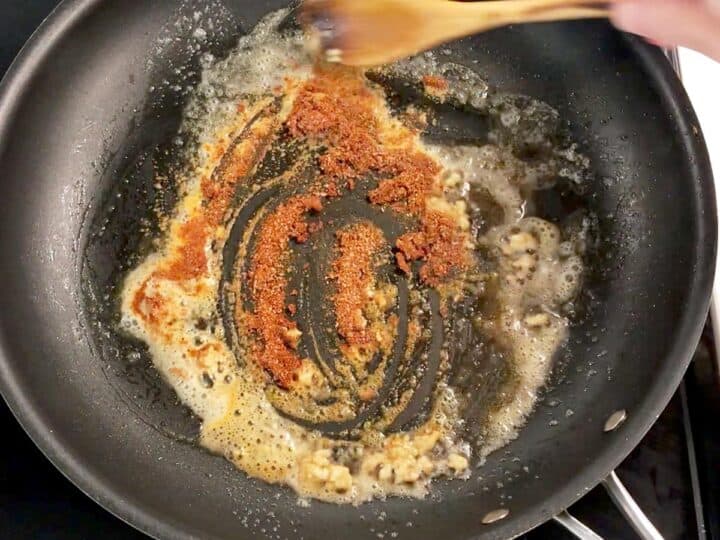 Cooking garlic and spices.