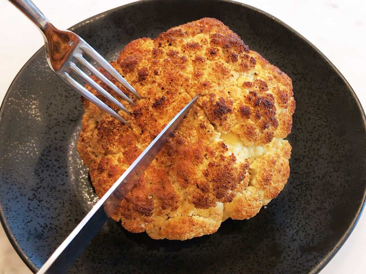 Cutting the cauliflower.