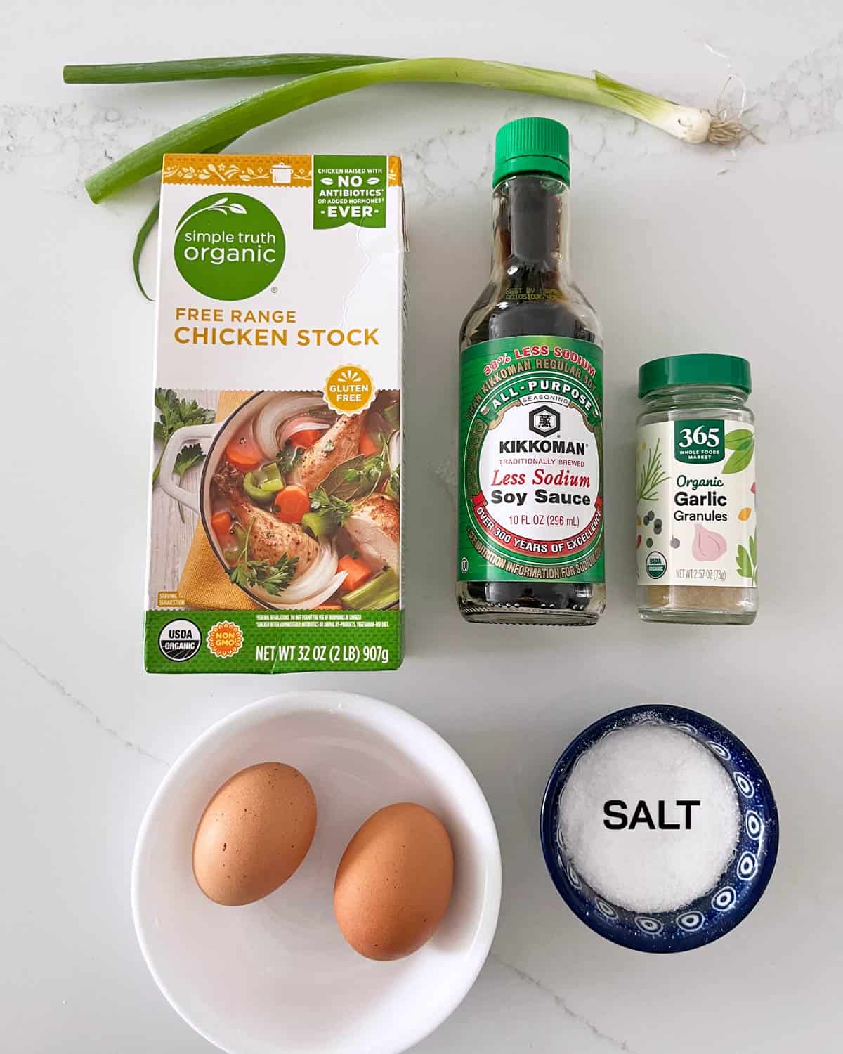 The ingredients needed to make an egg drop soup.