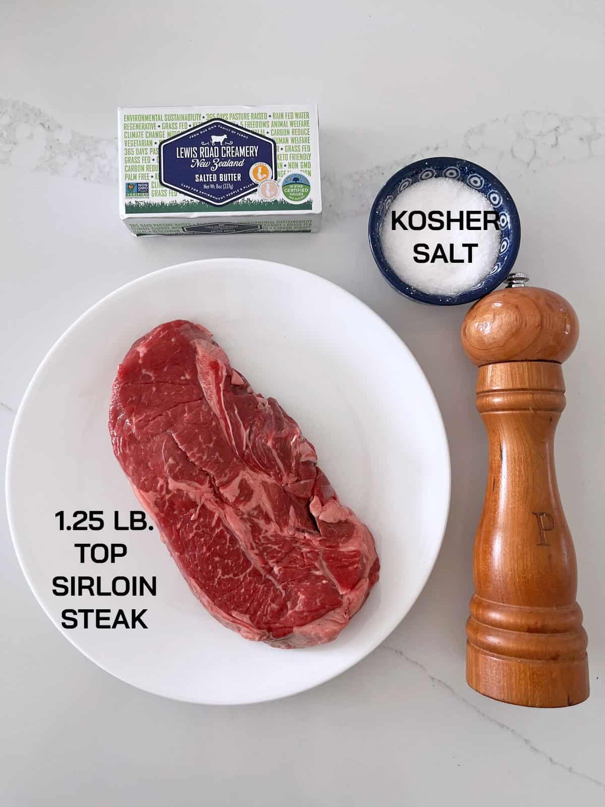The ingredients needed to cook a top sirloin steak.