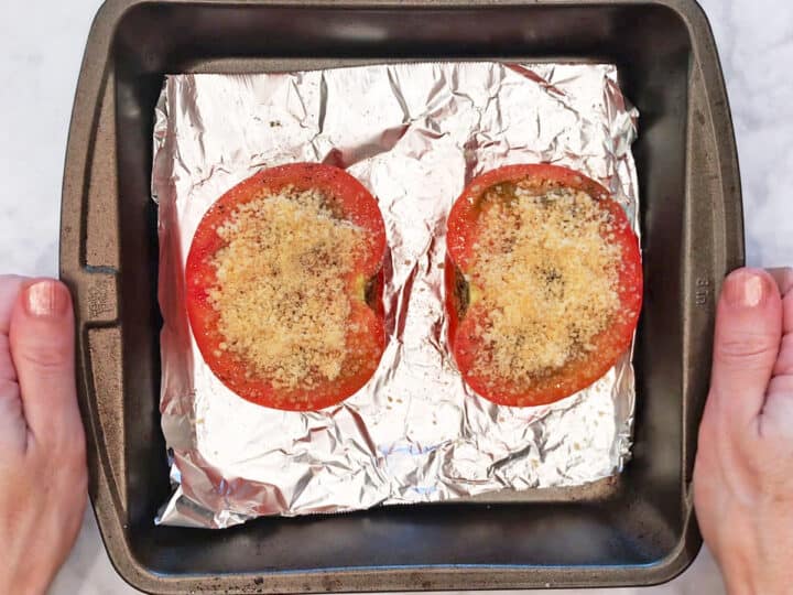 The tomatoes were topped with parmesan.