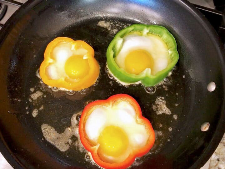 The eggs were added to the bell pepper slices.