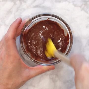 Stirring the melted chocolate.