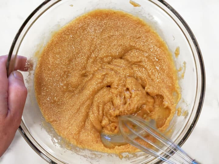 Mixing the ingredients for the bars' bottom layer.