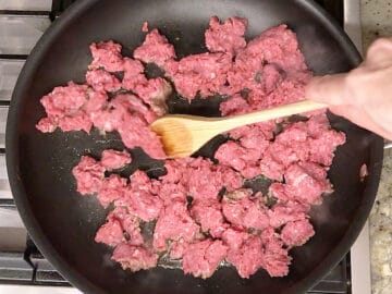 Cooking ground beef in a skillet.