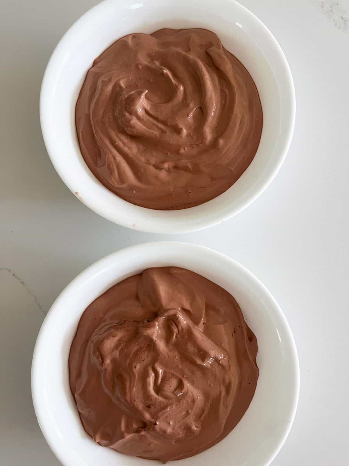 The mousse was divided between two bowls.