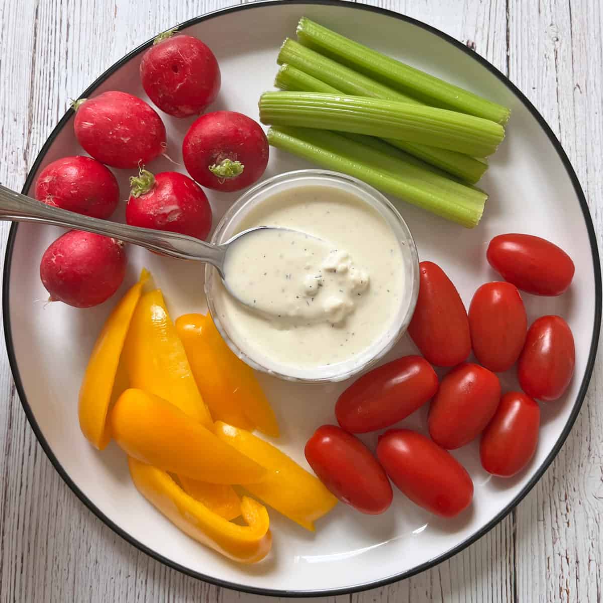 Blue cheese dressing is served with fresh veggies.