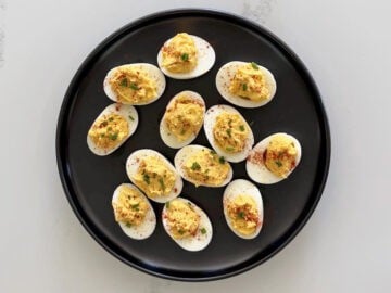 The eggs were garnished with paprika and chives.