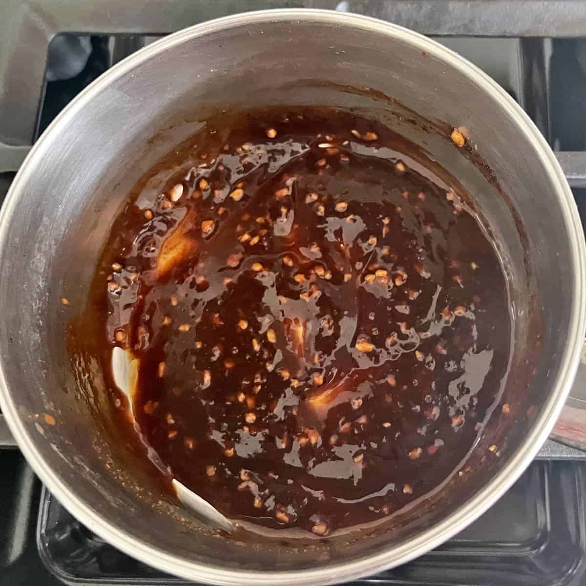 The sauce has thickened and is ready.